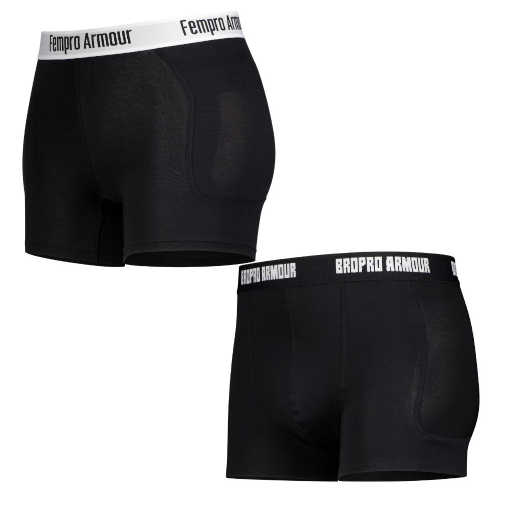 two pairs of black compression shorts with fempro and bropro branding on the waistbands